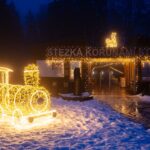 Osvětlená večerní Stezka korunami stromů Krkonoše
