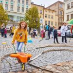 Sundání draka z věže Staré radnice