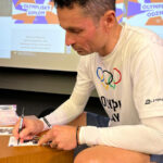 Mládežka se zahalila do pěti kruhů a přivítala sportovní legendu